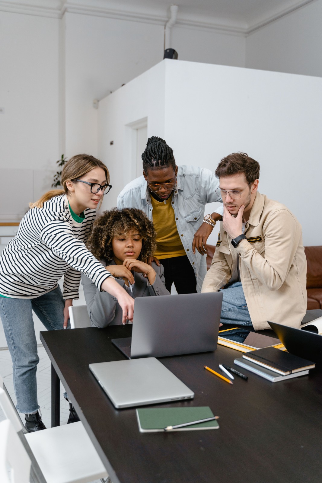 College students working together on an academic project